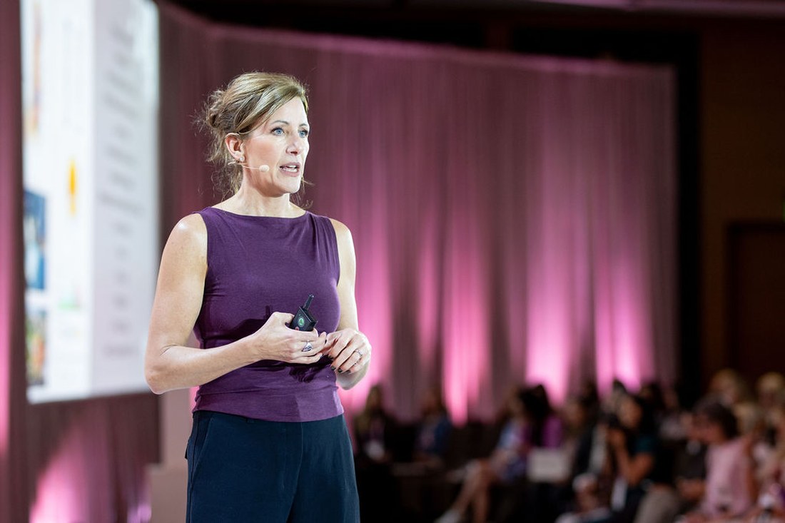 Kim Vopni teaching on stage